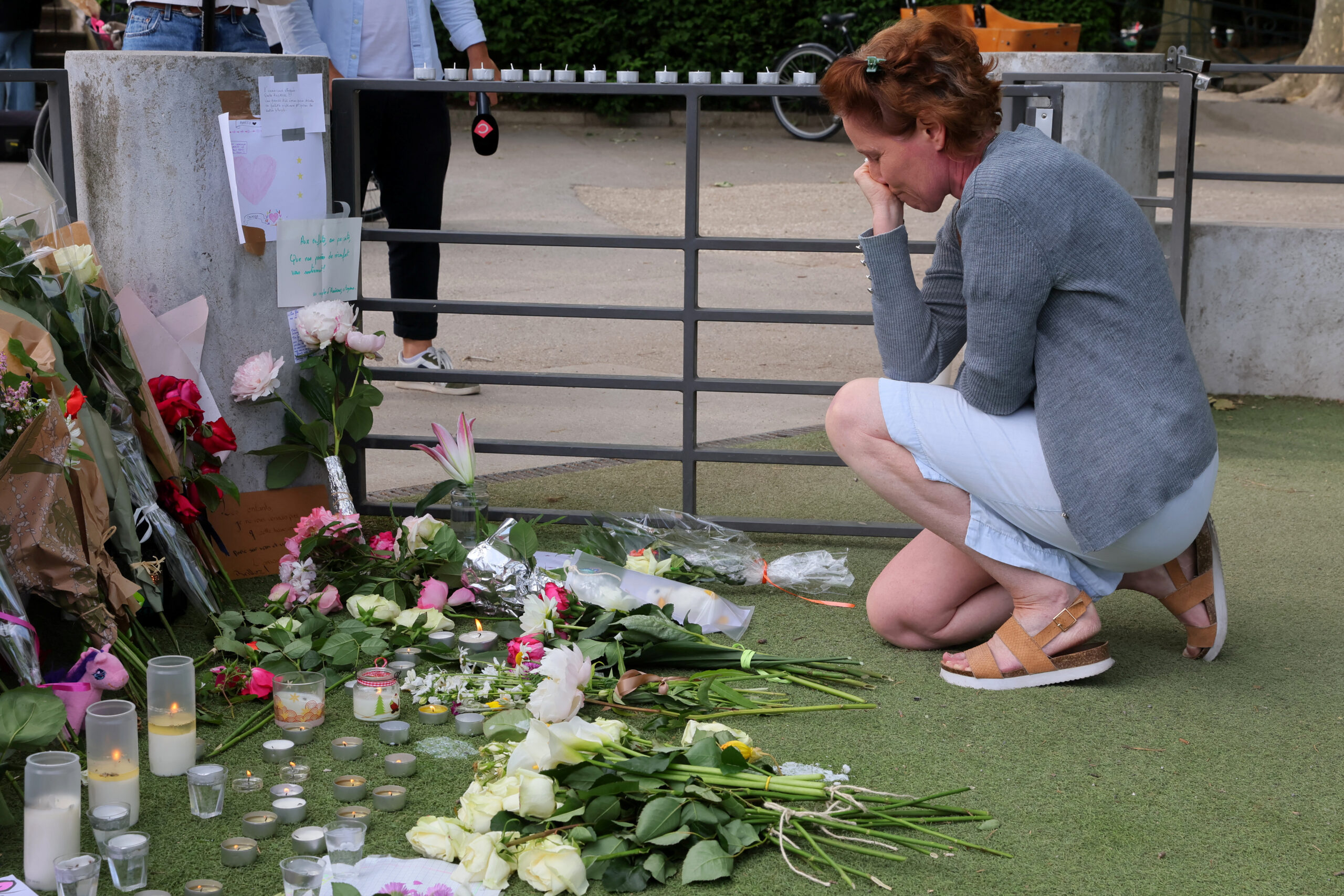 Tribute for victims the day after knife attack in French alpine town of Annecy